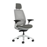 A three-quarter view of the Steelcase Series 2 high-back office chair, featuring a white frame with a grey mesh Airback, seat, and headrest